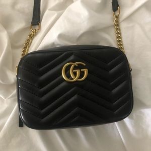 Elegant Black Crossbody Bag with Gold Accents